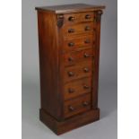 An early Victorian mahogany Wellington chest, fitted seven long graduated drawers with turned knob