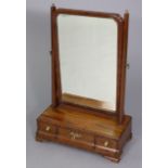 A Queen Anne style mahogany swing dressing table mirror of rectangular form with re-entrant upper