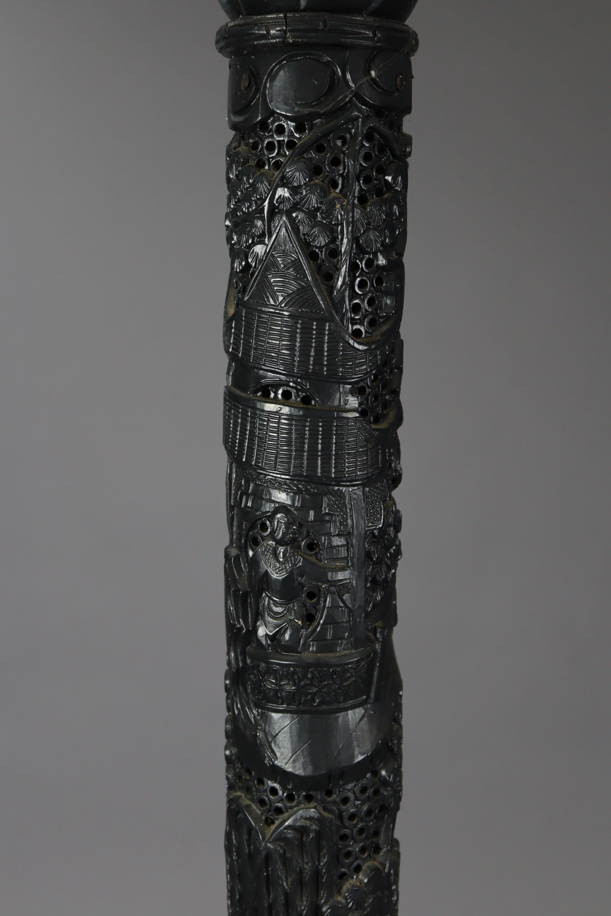 An early 20th century eastern carved & pierced ebonised wooden torchere/standard lamp, the - Image 5 of 11