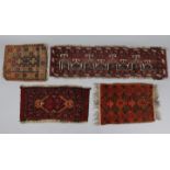 A small Afghan runner of madder ground, 1’5” x 4’8”; together with three various small rugs, 1’4”