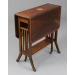 A late Victorian inlaid mahogany Sutherland table, with marquetry circle to the rectangular top