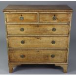 An early 19th century mahogany small chest, fitted two short & three long graduated drawers with