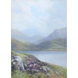 FREDERICK JOHN WIDGERY (1861-1942). A mountainous lake scene with heather to the fore, & gulls