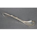 A Scottish silver preserve spoon with a spiralling whip handle inset amethyst cabochon to the tip,