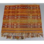 A Kelim rug with all-over striped multicoloured design, geometric decoration in ivory, guard