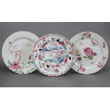 Two 18th century Chinese porcelain 9” plates decorated in famille rose enamels with floral sprays; &