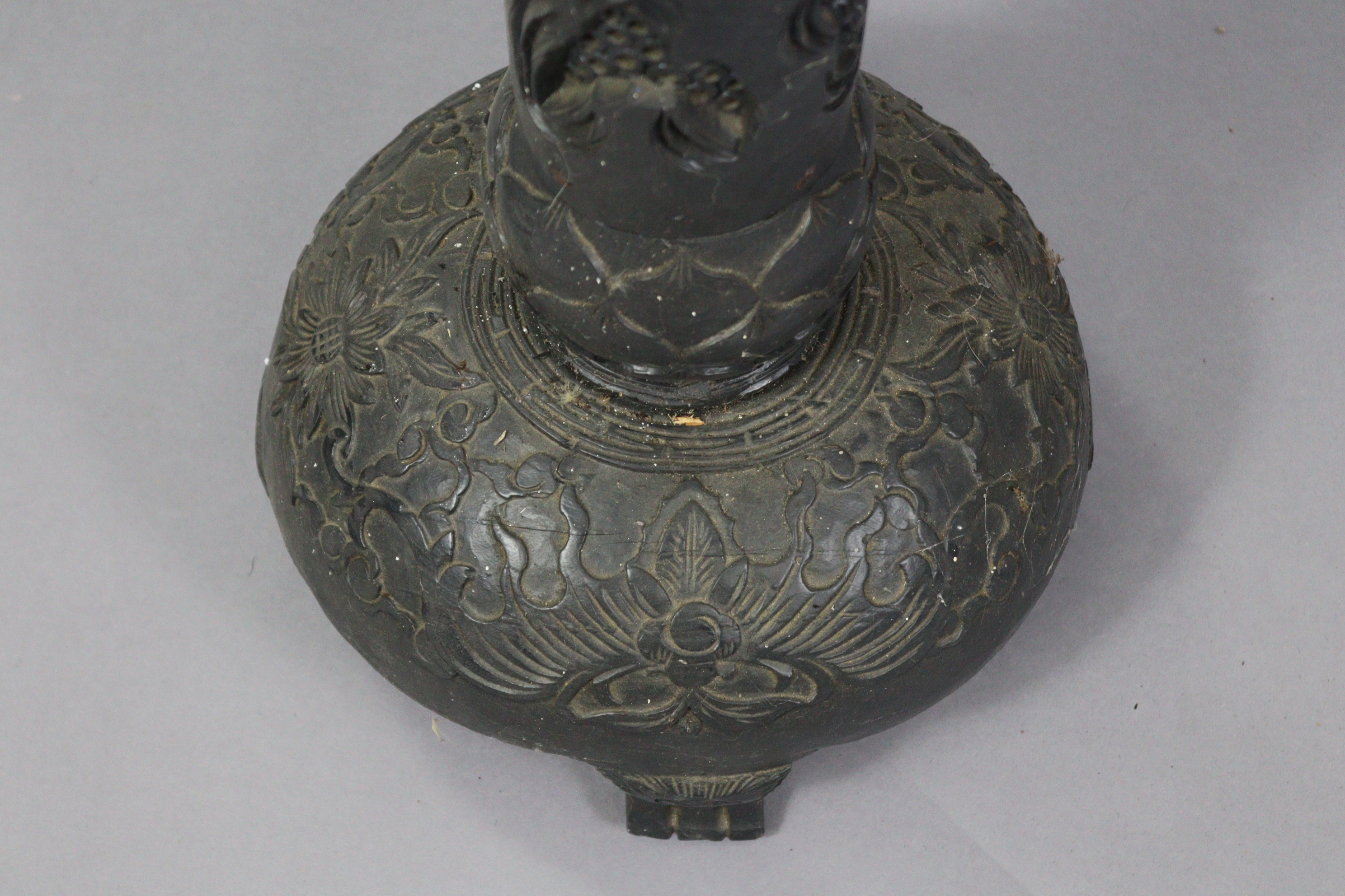 An early 20th century eastern carved & pierced ebonised wooden torchere/standard lamp, the - Image 7 of 11
