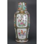A Chinese porcelain large Cantonese baluster vase with famille rose decoration of figure scenes,