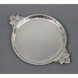 A Georg Jensen Danish sterling silver “Cactus” pattern circular two-handled tray designed by