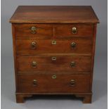 A George III style mahogany small chest, with moulded edge to the overhang top, fitted two short &