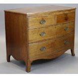 An early 19th century inlaid oak & mahogany bow-front chest, with rosewood crossbanding, fitted