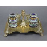 A 19th century brass rectangular inkstand with raised scroll gallery & engraved foliate