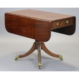 A regency mahogany drop-leaf supper table, with rounded corners & reeded edge, fitted frieze drawer,