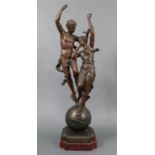A bronzed speltre statue after Ernest Racoulet titled ‘L’aube du Jour” (dawn of the day), with