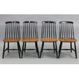 A set of four ebonised & plain wood spindle-back kitchen chairs with hard seats, & on round