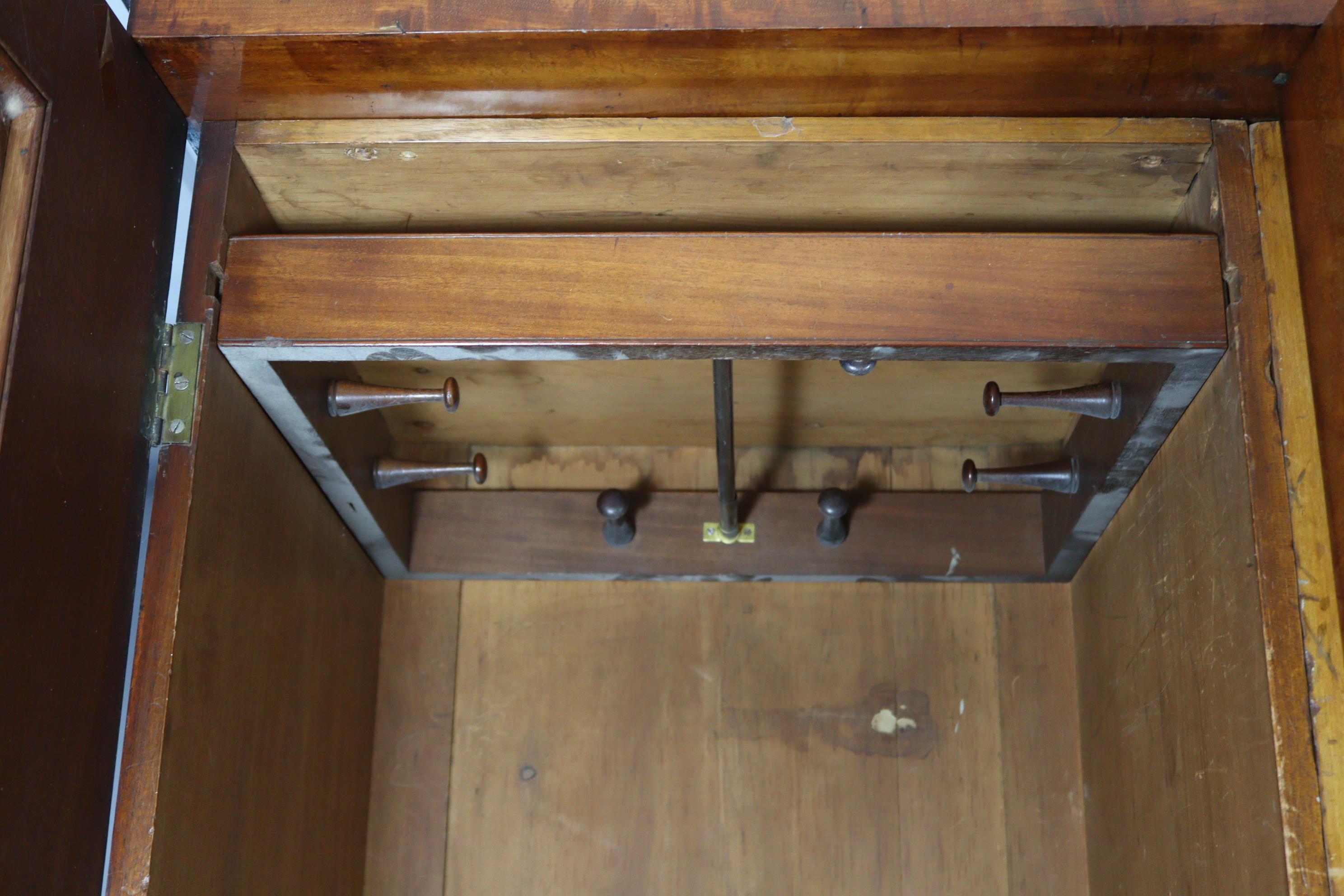 A Victorian hanging mahogany wardrobe with moulded cornice, enclosed centre mirror door, a panel - Image 3 of 9