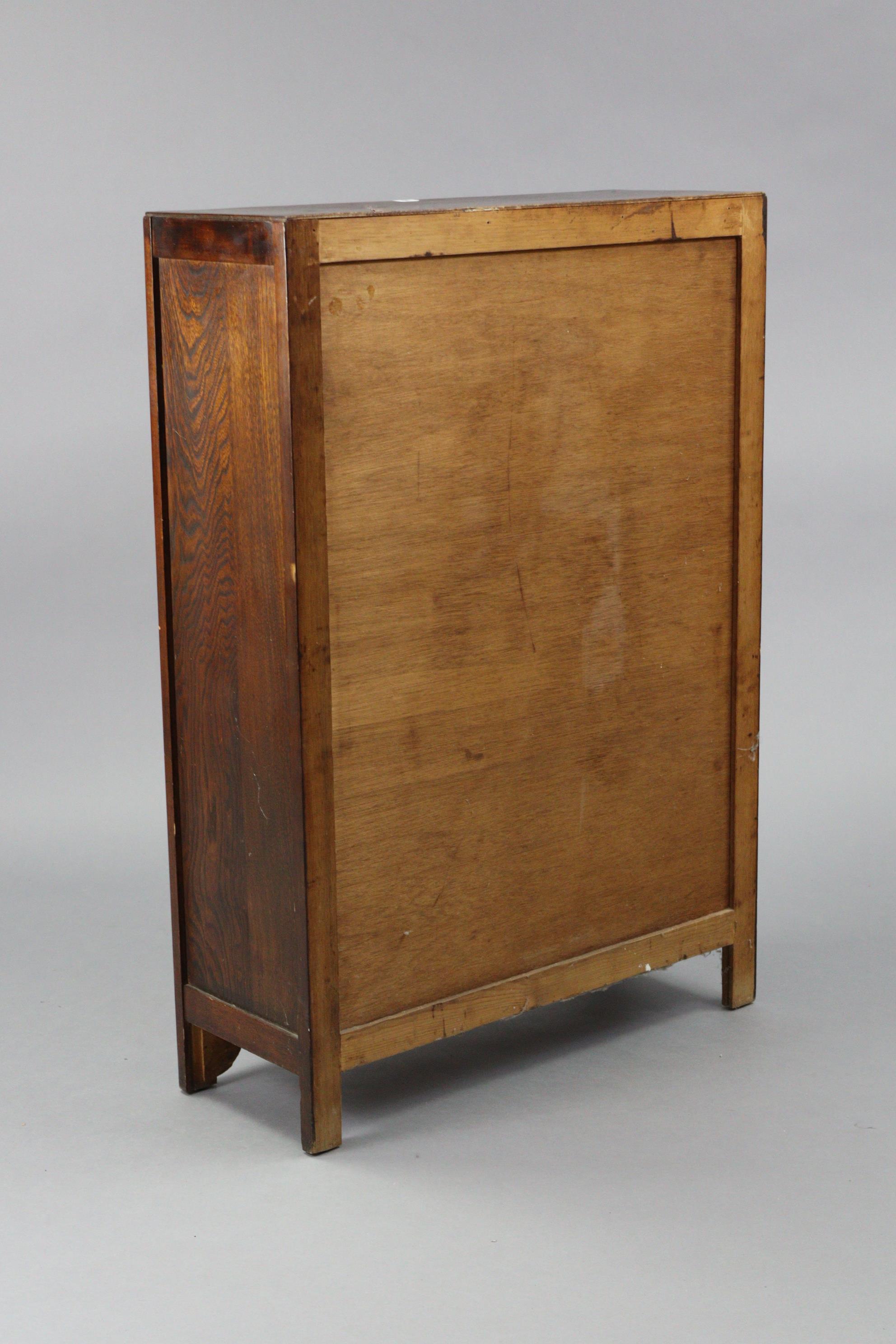 An oak bookcase fitted three shelves enclosed by a pair of glazed doors, 29½” wide x 42½” high. - Image 4 of 4