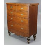 A late Victorian walnut chest fitted two short & three long graduated drawers, with shaped