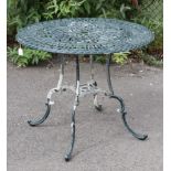 A green painted aluminium patio table with pierced circular top, & on four shaped legs, 33” diameter