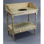 A pine rectangular tray-top two-tier washstand on turned supports, 30” wide x 34½” high x 16½”