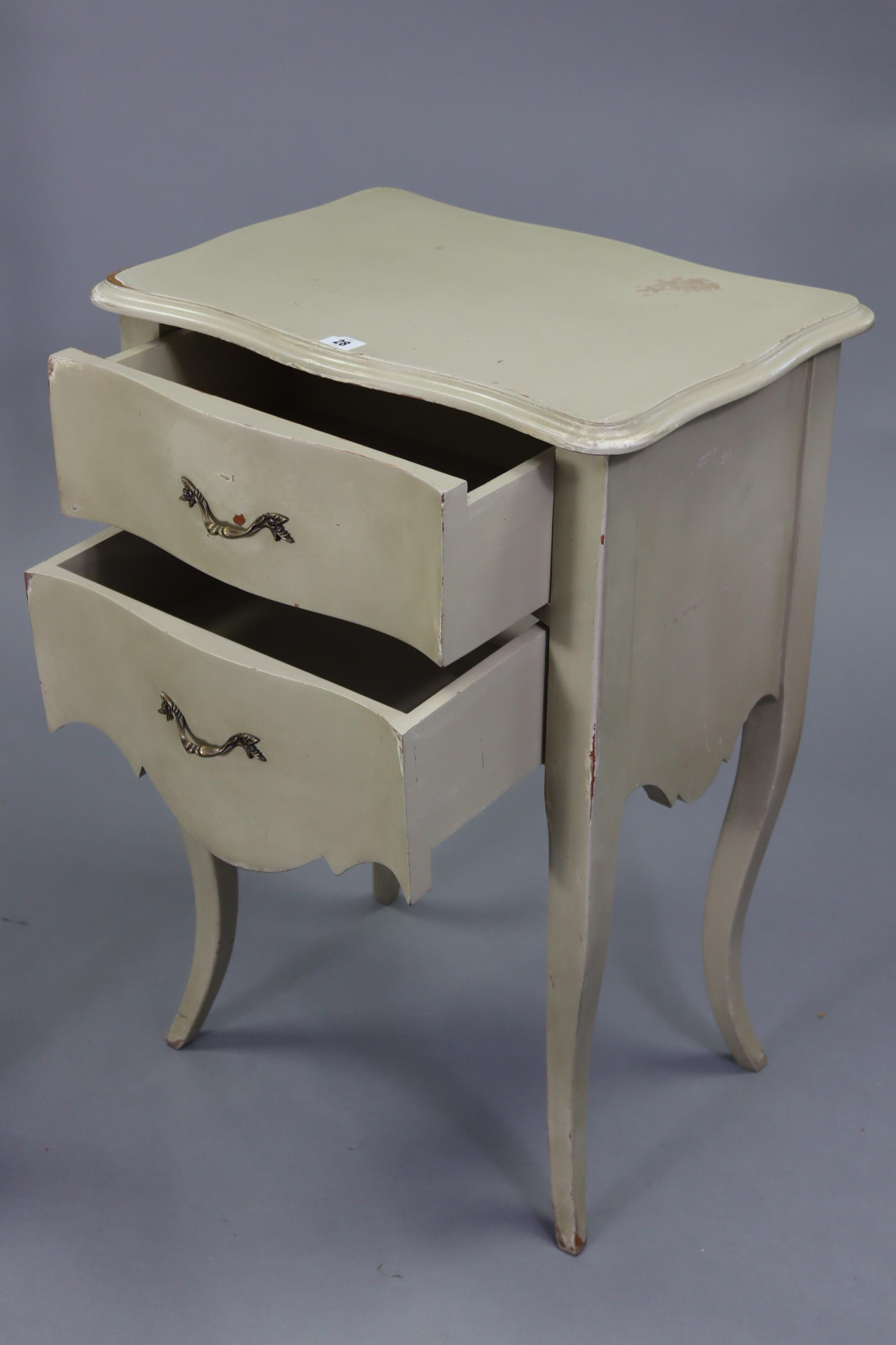 A cream-finish serpentine-front bedside chest fitted two long graduated drawers, & on slender - Image 2 of 5