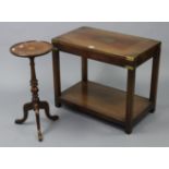 A reproduction brass-mounted mahogany campaign-style rectangular two tier coffee table on square