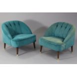 A pair of tub-shaped easy chairs each with buttoned back & sprung seat upholstered turquoise velour,