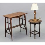 An Edwardian mahogany rectangular occasional table on square tapered legs with open undertier, 24”