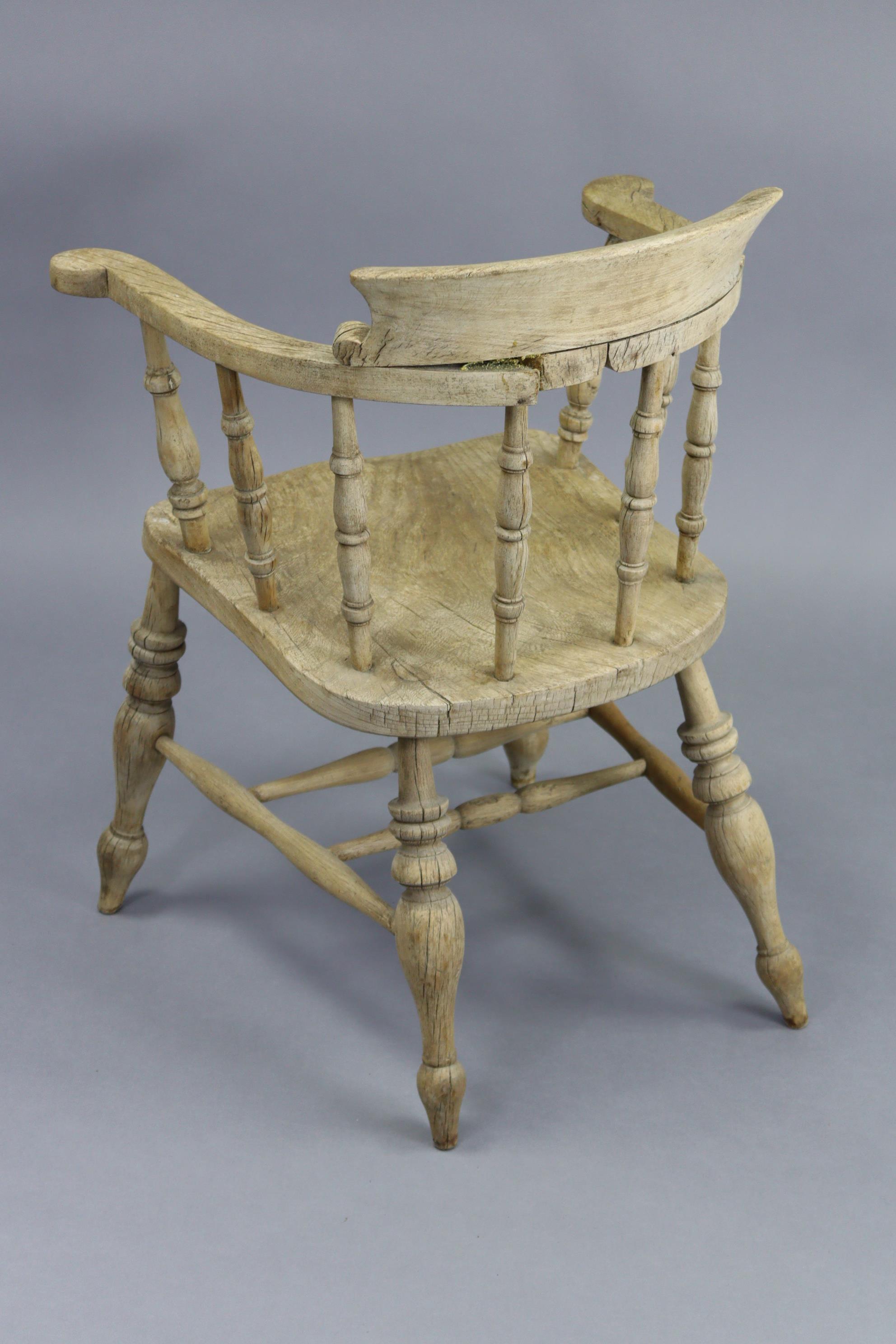 A spindle-back captain’s chair with hard seat, & on turned legs with spindle stretchers. - Image 5 of 6