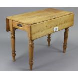 A Victorian pine drop-leaf kitchen table, fitted end drawer & on four turned legs, 41¾” wide x