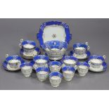 A late Victorian china twenty-six piece part tea & coffee service of white ground with blue