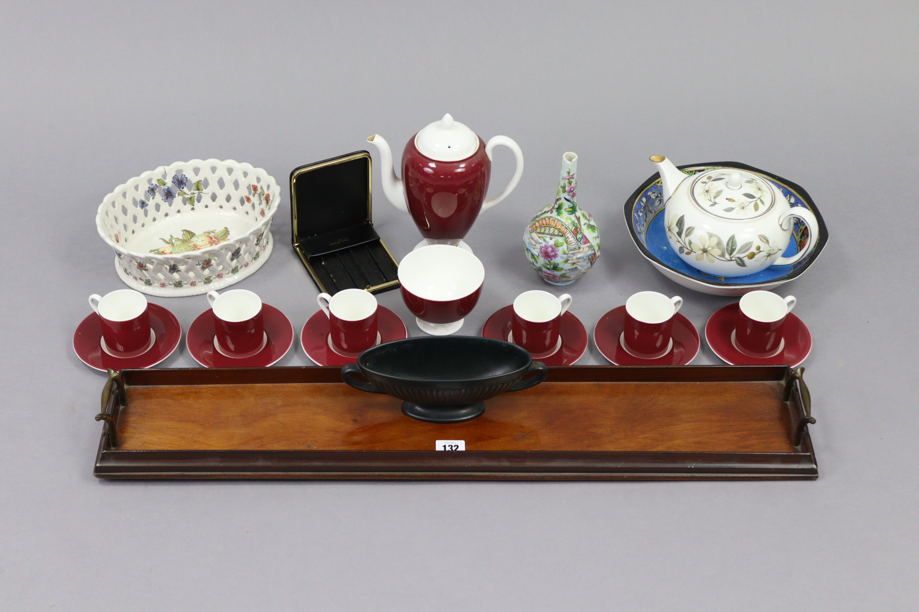 A mahogany rectangular two-handled tea tray of narrow proportions, 30” x 6”; together with two cigar