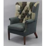 A Tetrad Harris Tweed Mackenzie buttoned-back armchair upholstered multi-coloured material, & on