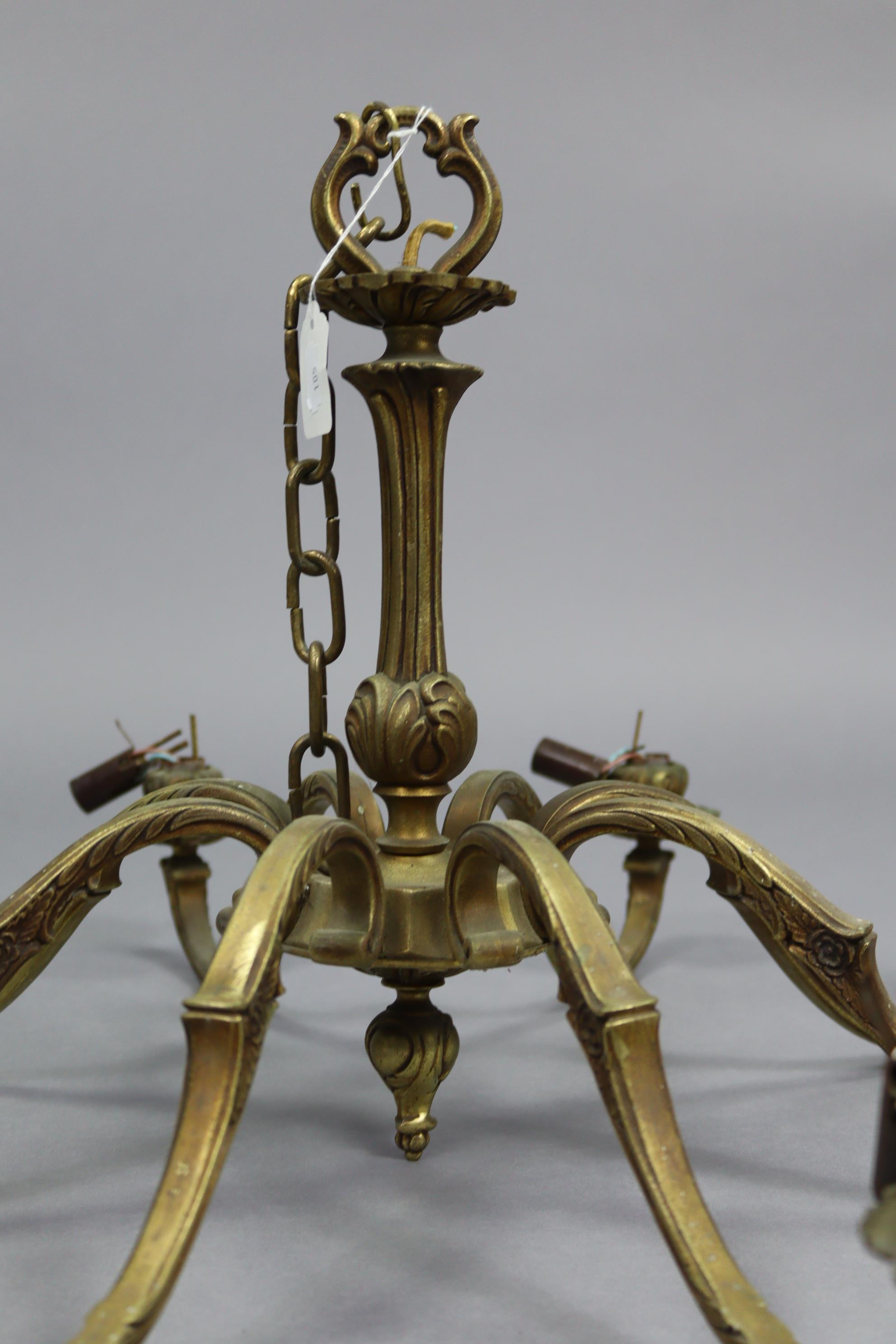 A brass eight-branch chandelier with scroll-arms, 30” wide x 15” high. - Image 2 of 4