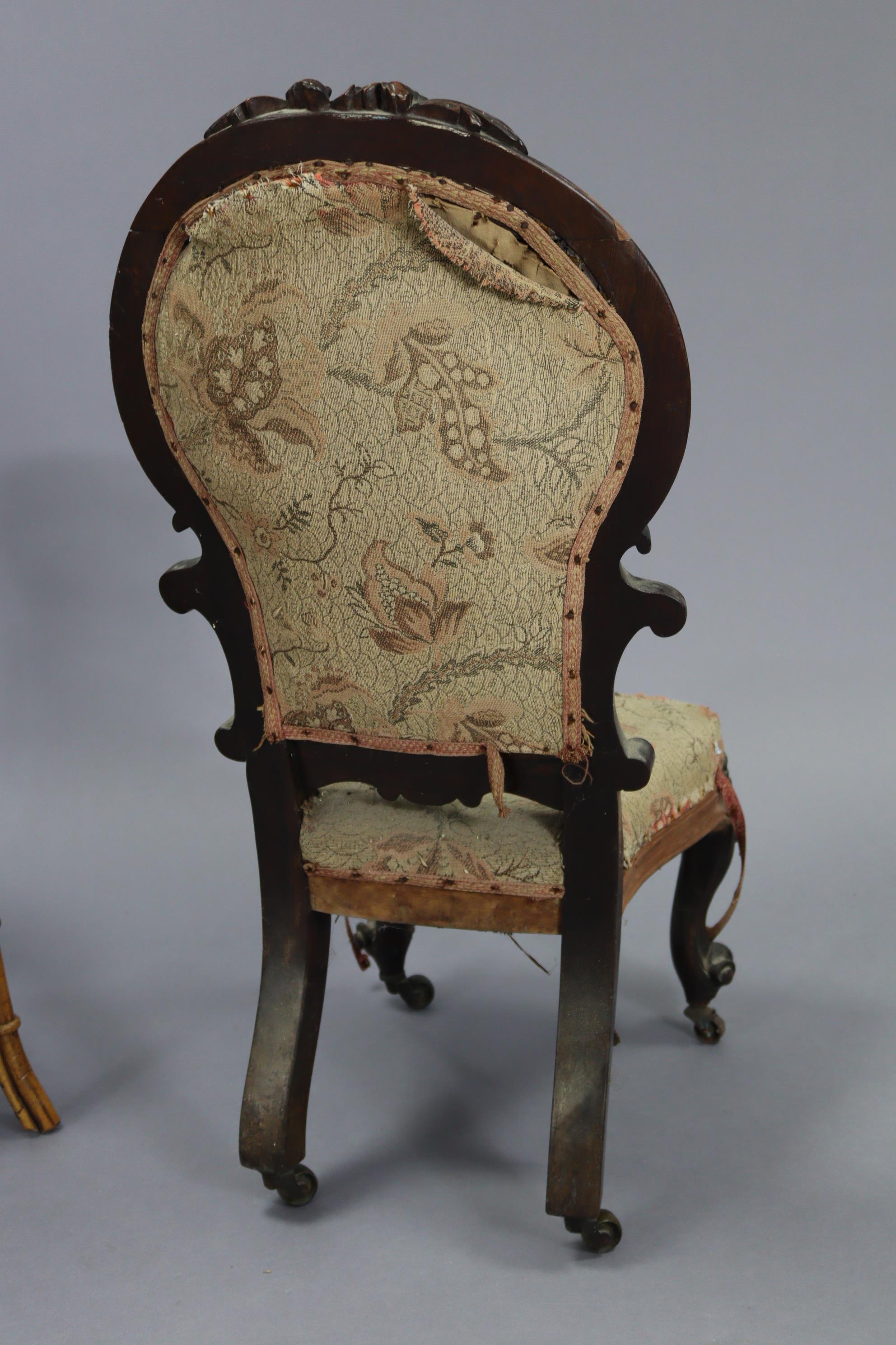 A Victorian carved mahogany frame child’s chair with shield-shaped back, padded seat, & on short - Image 4 of 5