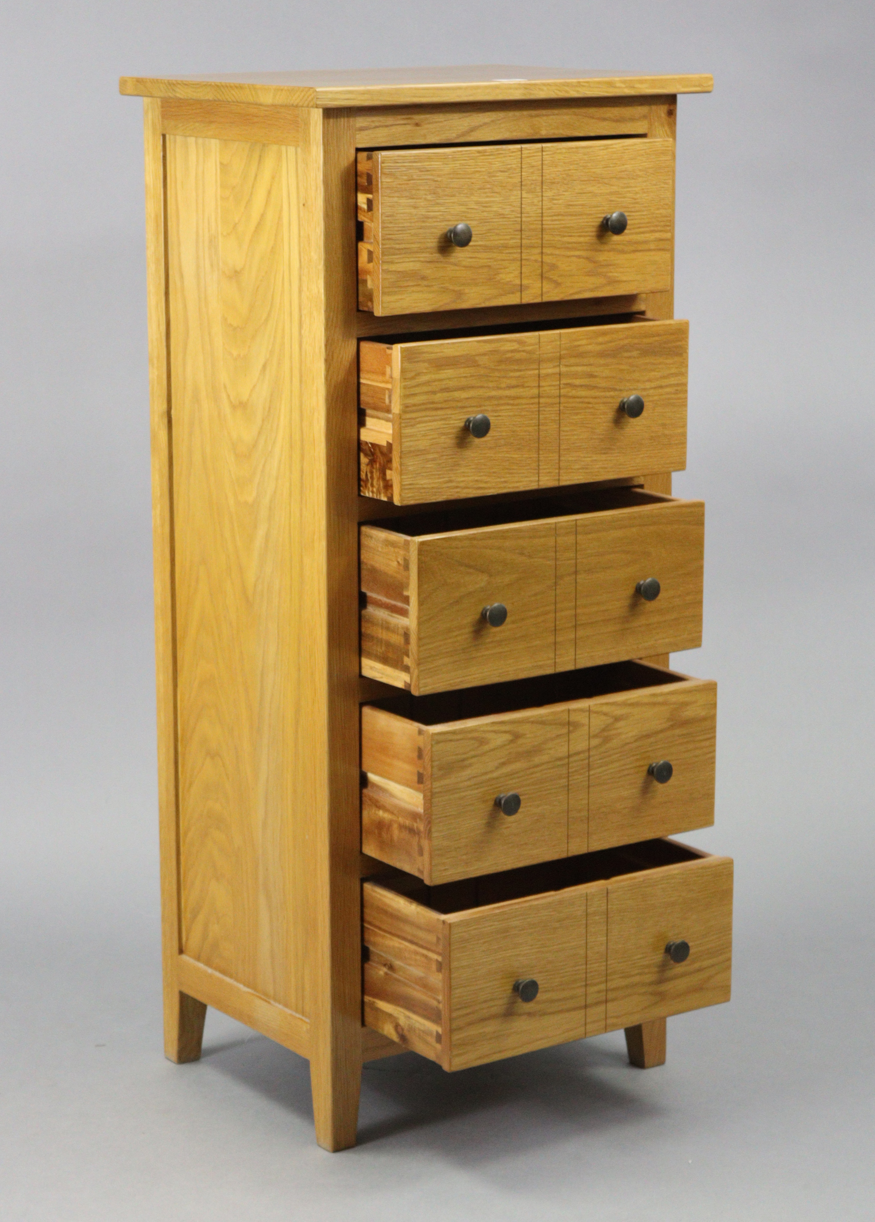 A modern light oak small upright chest fitted five long drawers, 19½” wide x 43½” high x 15” deep. - Image 2 of 3