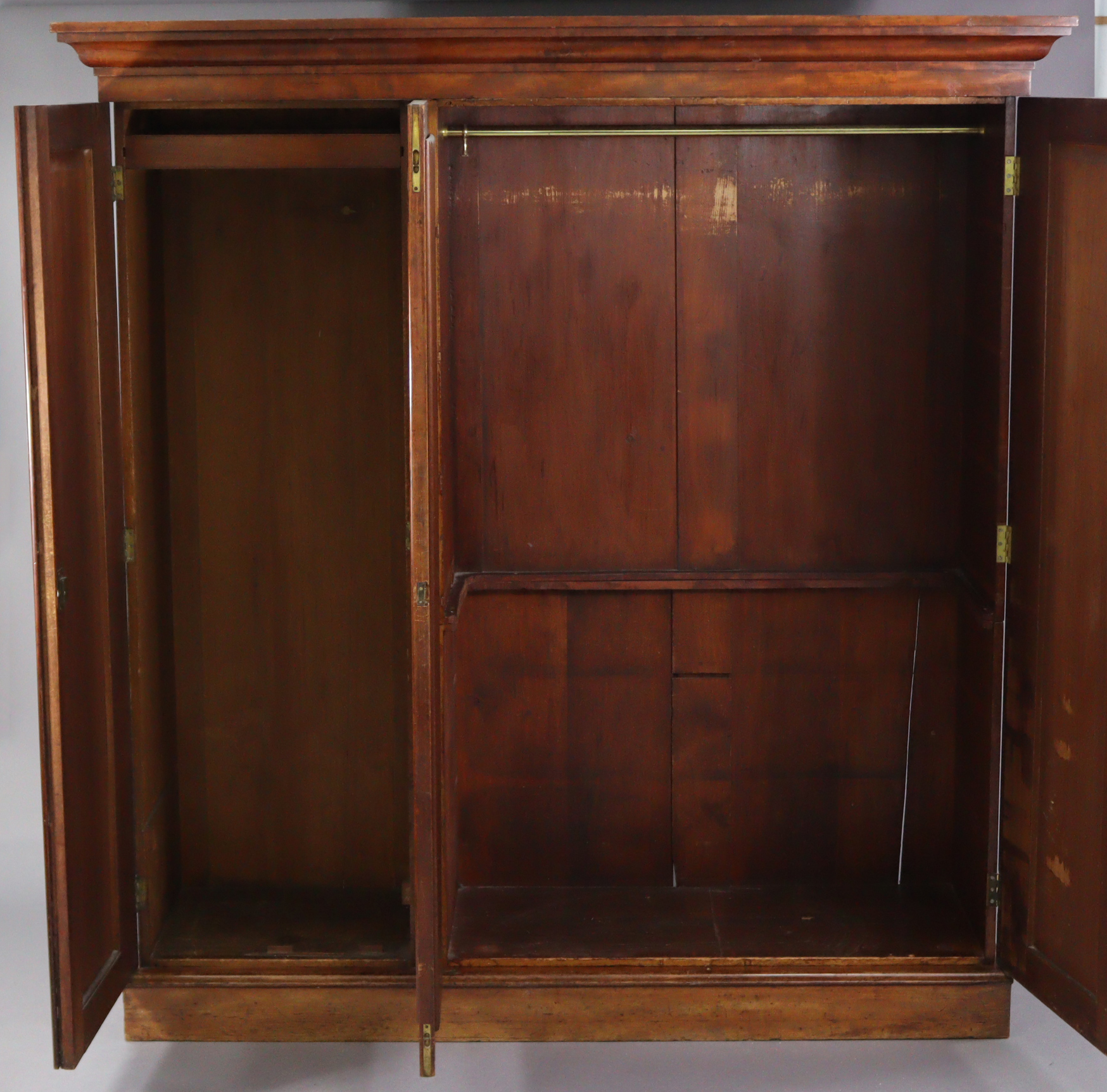 A Victorian hanging mahogany wardrobe with moulded cornice, enclosed centre mirror door, a panel - Image 2 of 9