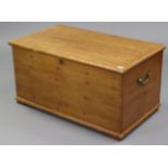 A pine blanket box with hinged lift-lid, & with brass side handles, 36” wide x 18¼” high x 21”