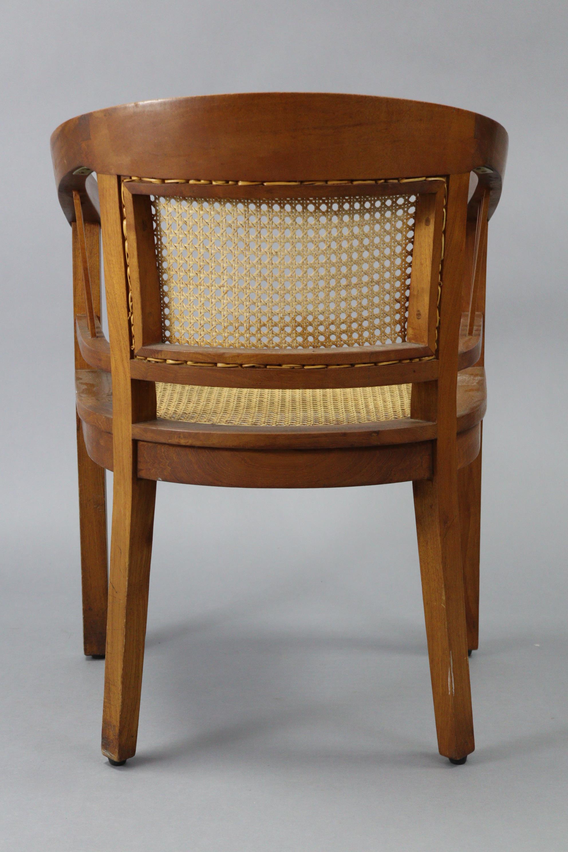 A teak tub-shaped chair inset woven-cane panel to the seat & back, & on square tapered legs. - Image 3 of 4