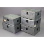 Five tin trunks (various sizes).