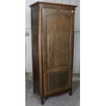 A French oak armoire with panelled sides & enclosed by a single panel door, 30” wide x 72" high x 19