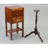 An oak needlework table with hinged lift-lid above a long drawer, & on square legs, 14” wide x 30 “
