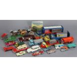 Twenty-four various die-cast scale models by Corgi, Dinky, & others, all unboxed.
