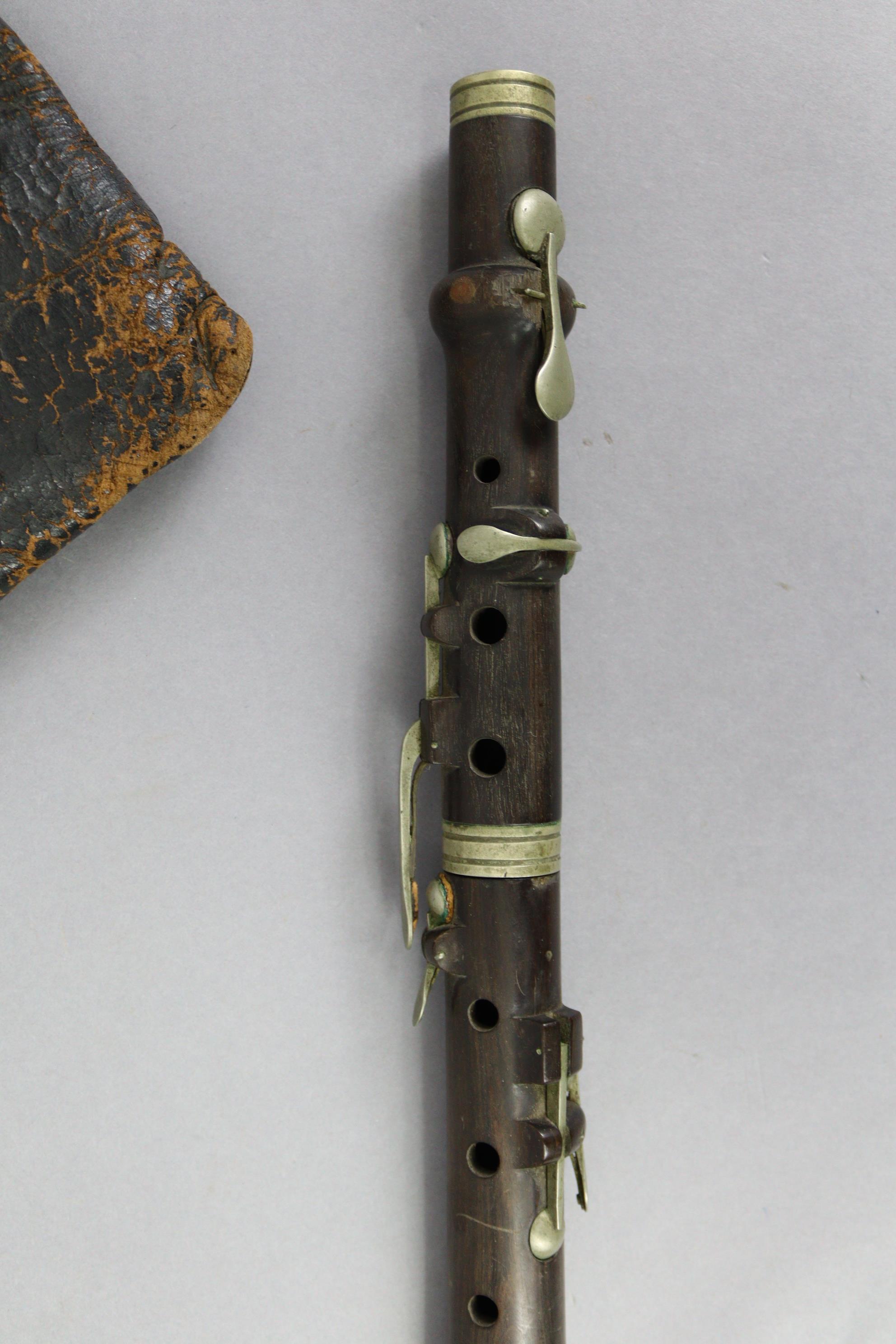 A rosewood flute (lacking mouthpiece) with chrome-plated keys, 19½” long, with case. - Image 2 of 5