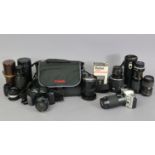 A Minolta “Dynax 5xi” camera; a ditto “Dynax 500si” camera, each with lens, & case; together with