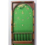 An early 20th century mahogany folding billiards/bagatelle table 60” x 15¾” (w.a.f.).