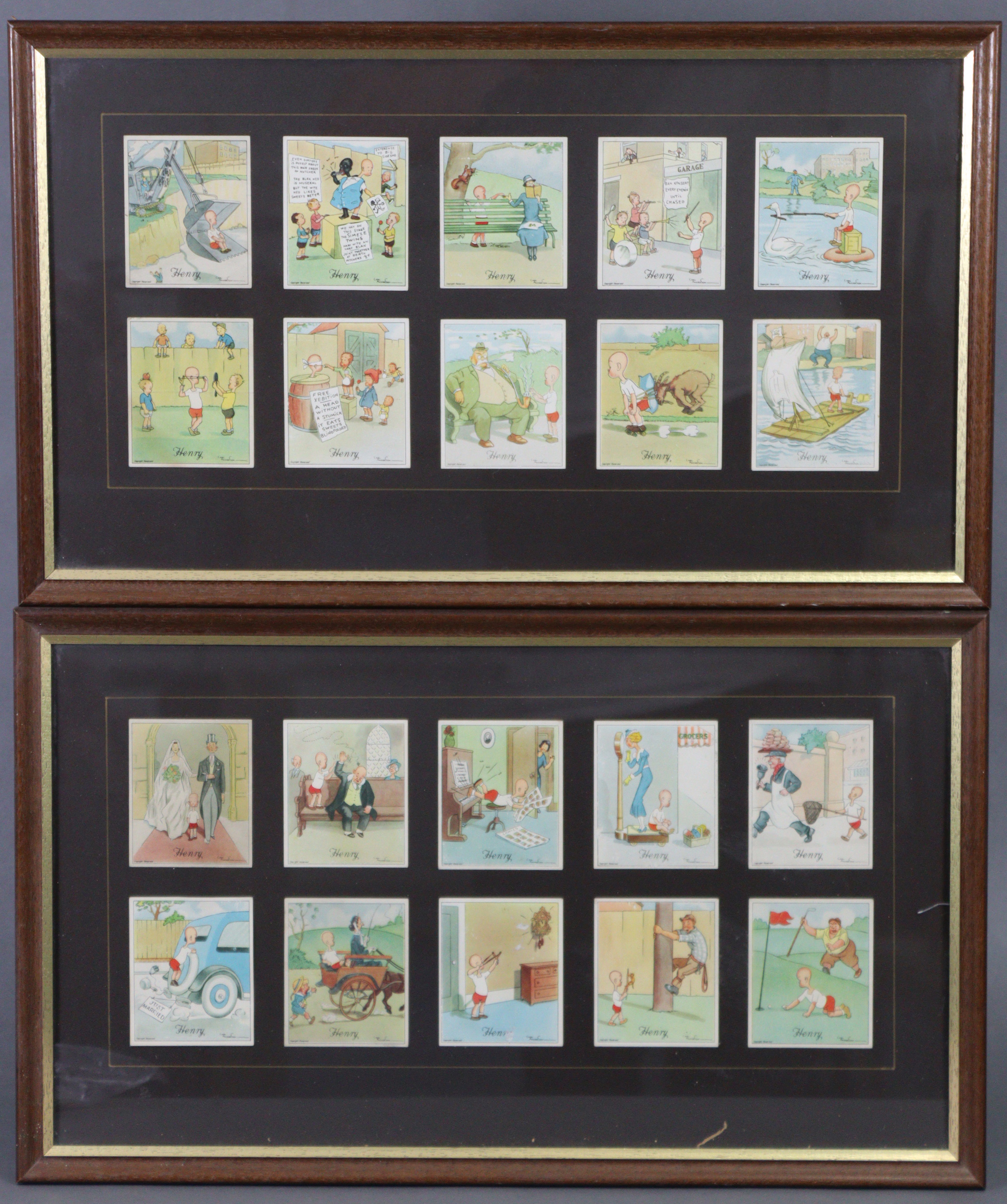 A part display of Kensitas “Henry” cigarette cards (20 of 50), displayed in a pair of glazed