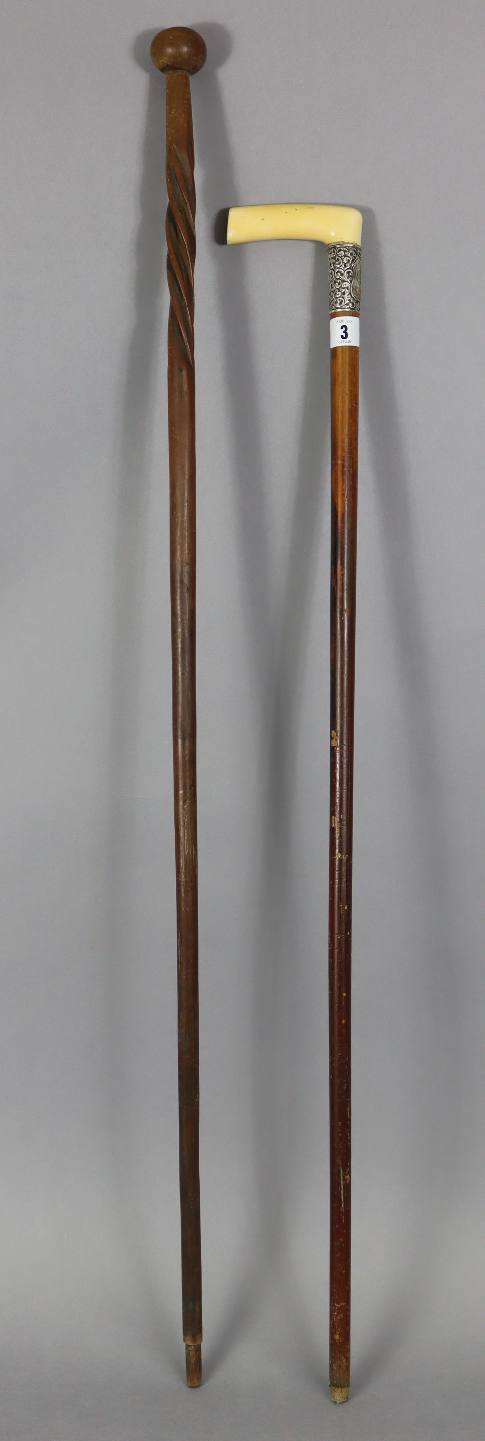 An Edwardian gent’s walking cane with ivory handle, & with embossed white-metal collar, 36” high; & - Image 2 of 2