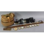 A wicker fisherman’s creel; together with three fishing reels; a fishing rod & various other