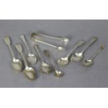 A pair of late Victorian silver sugar tongs, London 1895; & eight various silver spoons.